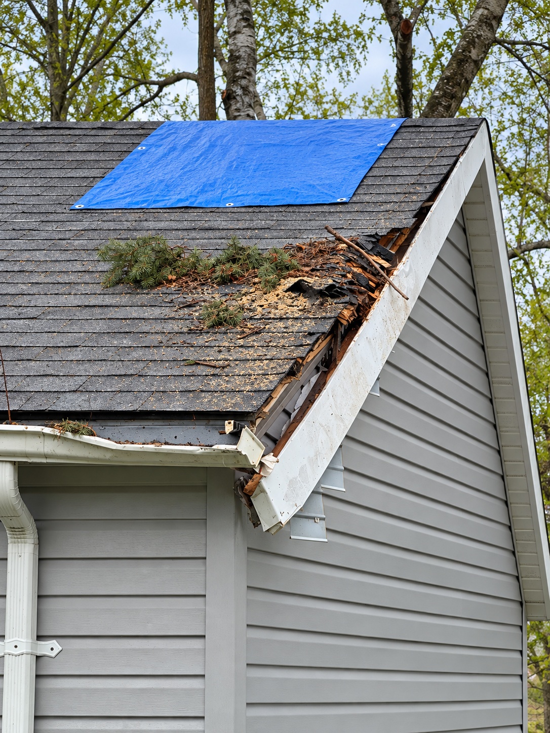 Roof corner tarped the same day